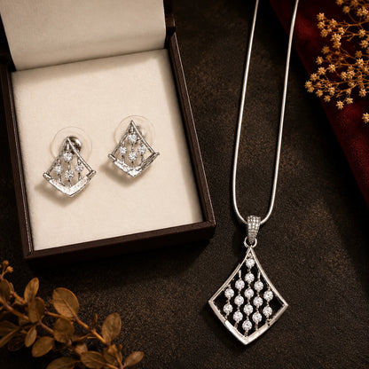 Pendant and earrings set displayed in box